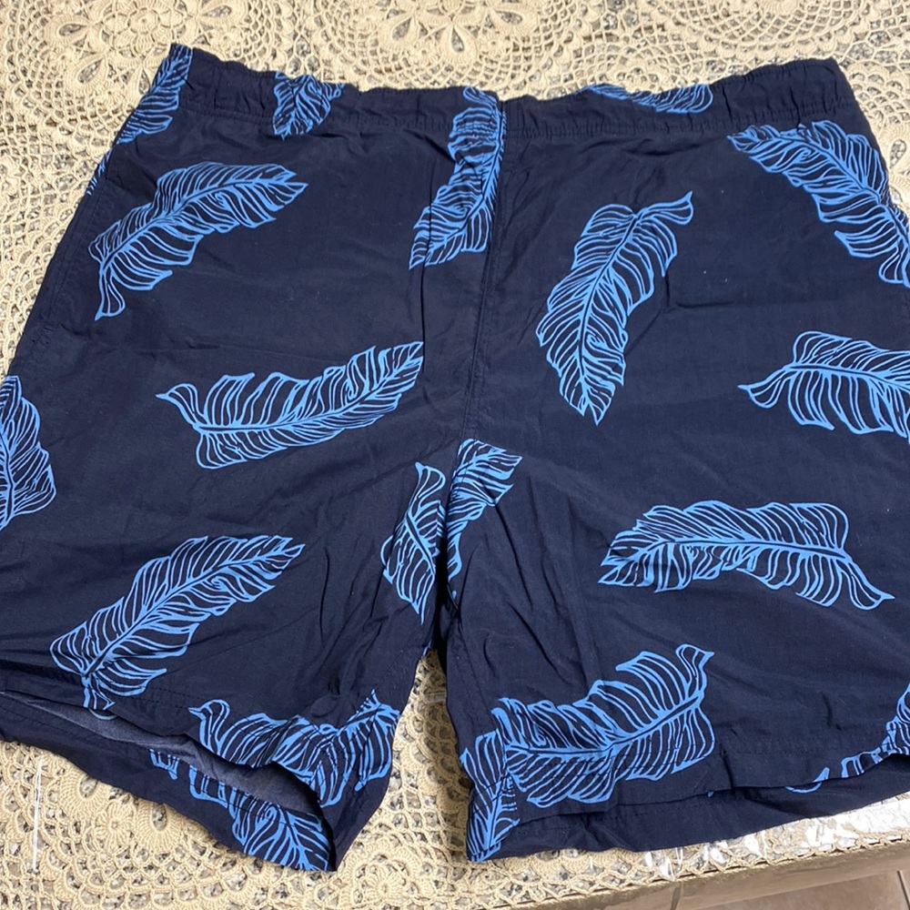 Navy blue bathing suit with blue leaves